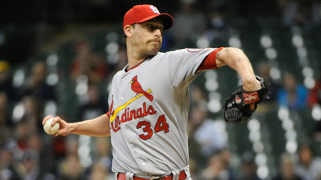 Axford returns to Miller Park a month after trade